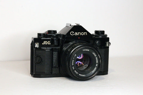 Canon A-1 35mm film camera with a Canon nFD 50mm f1.8 lens - READ!