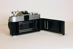 Back of a Bell & Howell FD35 camera with the film door open